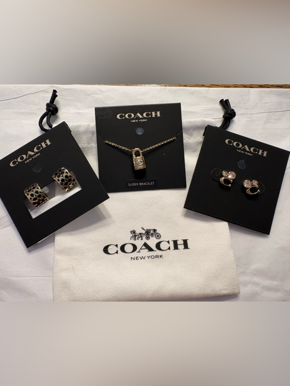 Coach Gold Tone Padlock Slider Bracelet